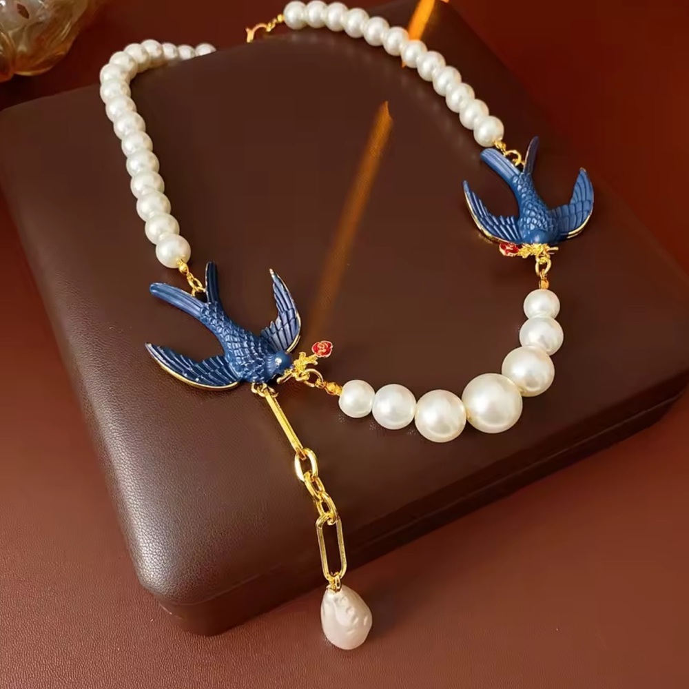 New listing vintage Pearl and Blue Bird Necklace
